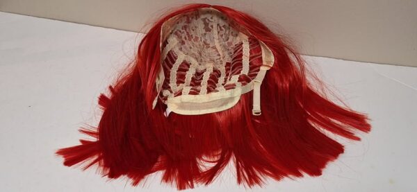 Bright red wig