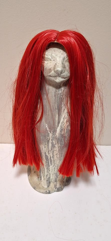 Bright red wig